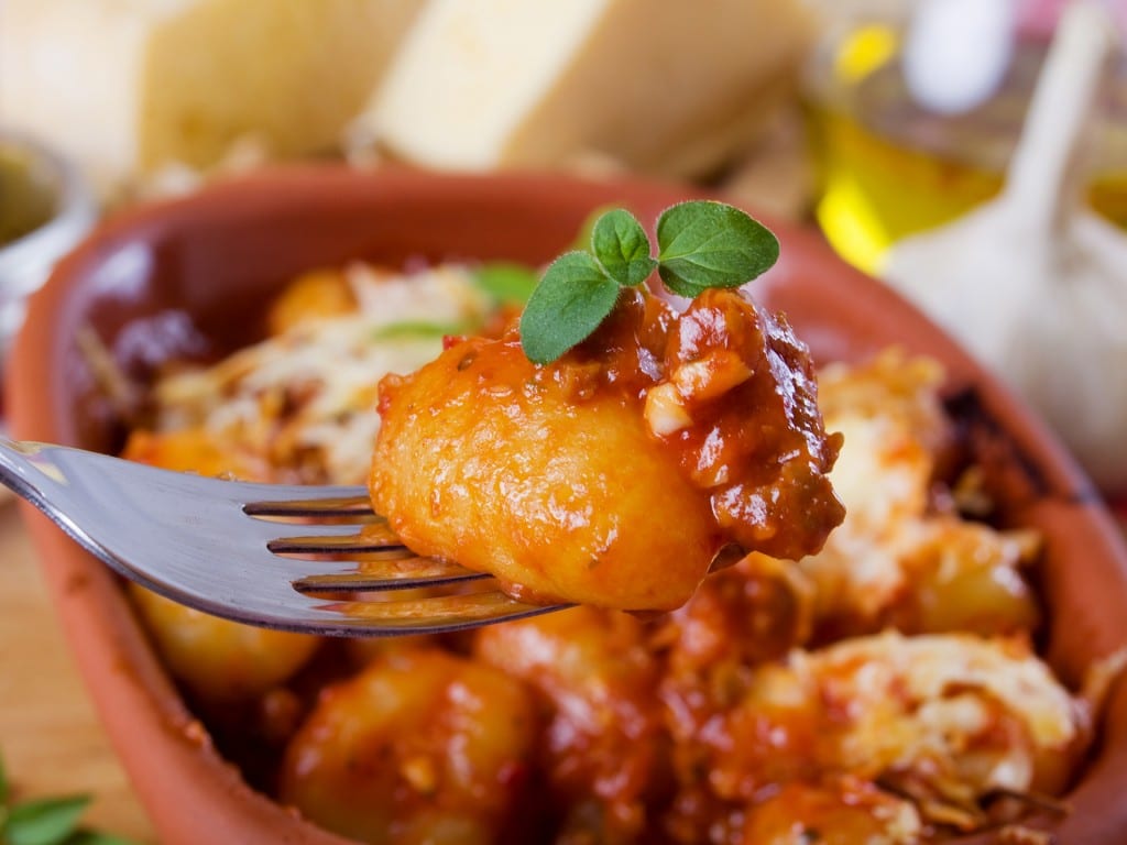 Gnocchi di patata, italian potato noodle with sauce bolognese and oregano
