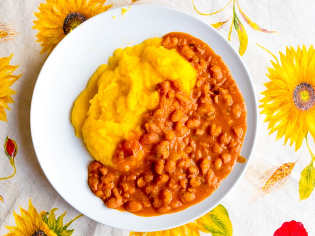 above view of old traditional polenta and beans italian farmers dish