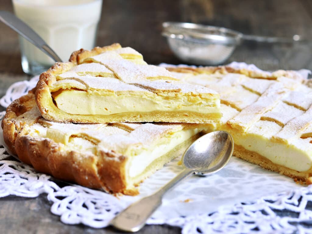 Crostata with ricotta on a rustic background.